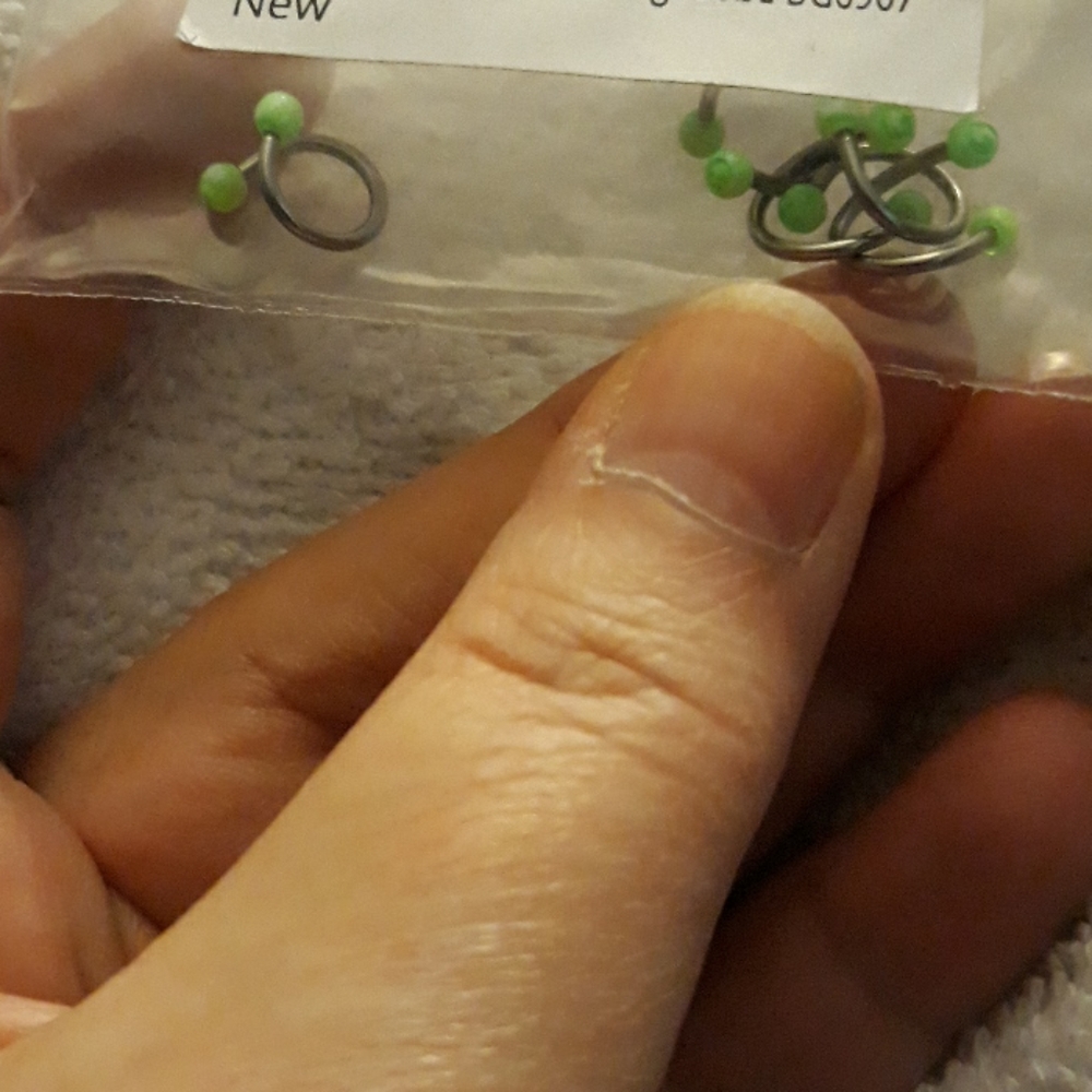 NWT 5 silver tone gauges with green bead ends